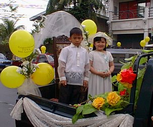 Nicole with escort Jay at float